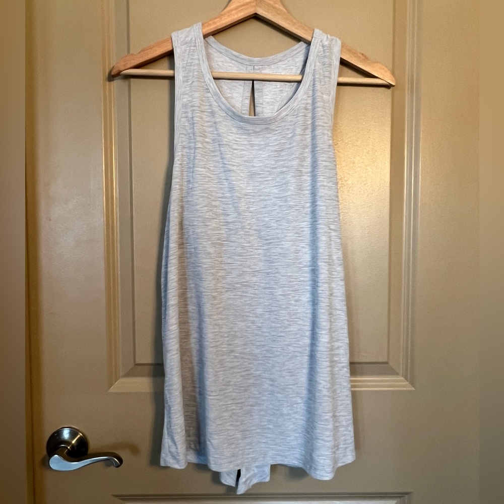 Light grey activewear tank top with optional tie in the back